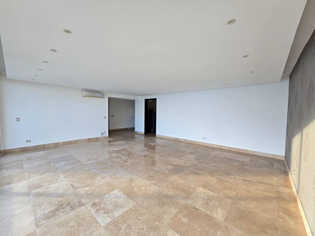 Kitchen with granite countertops, stainless appliances, and breakfast nook in Q Tower Punta Pacifica