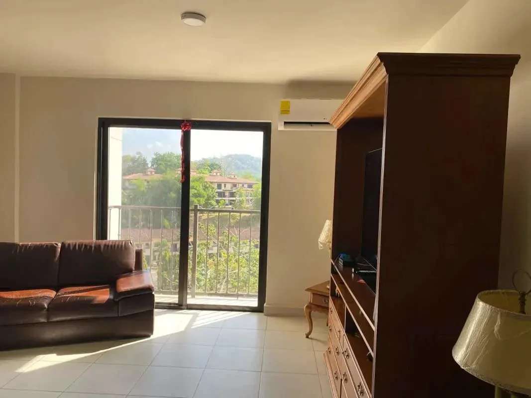 Private balcony with views of gardens and forest at PH Embassy Village Albrook Panama