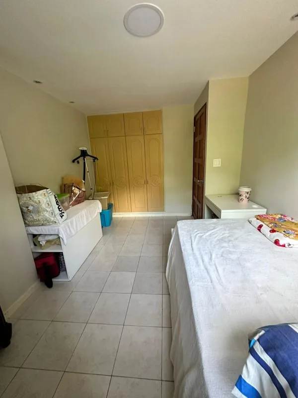 Enclosed balcony with glass windows and curtains PH Albrook Park Clayton Panama Rental