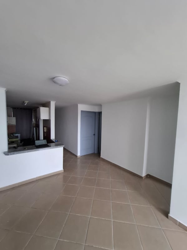 Open living-dining area with tile flooring in PH Pueblo Nuevo apartment Panama
