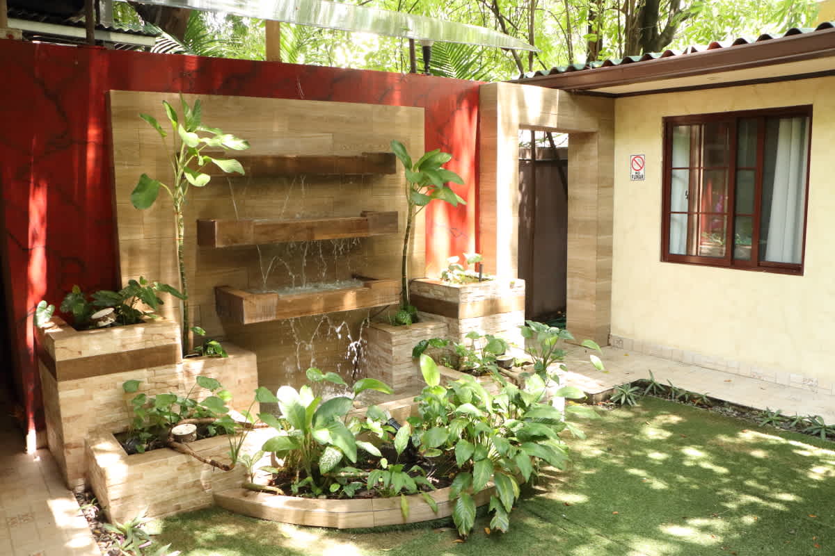 Garden courtyard with tropical plants Casa Rica Building Panama