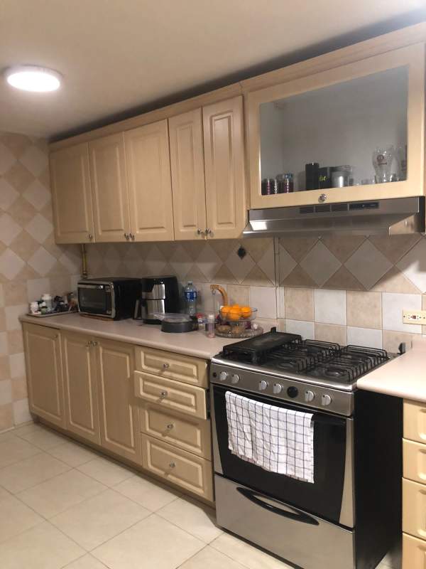 Resort-style swimming pool with slide and lush garden Condado del Rey Panama