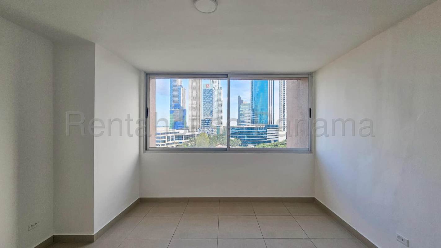 Master bedroom with big window city skyline view Costa del Este Panama