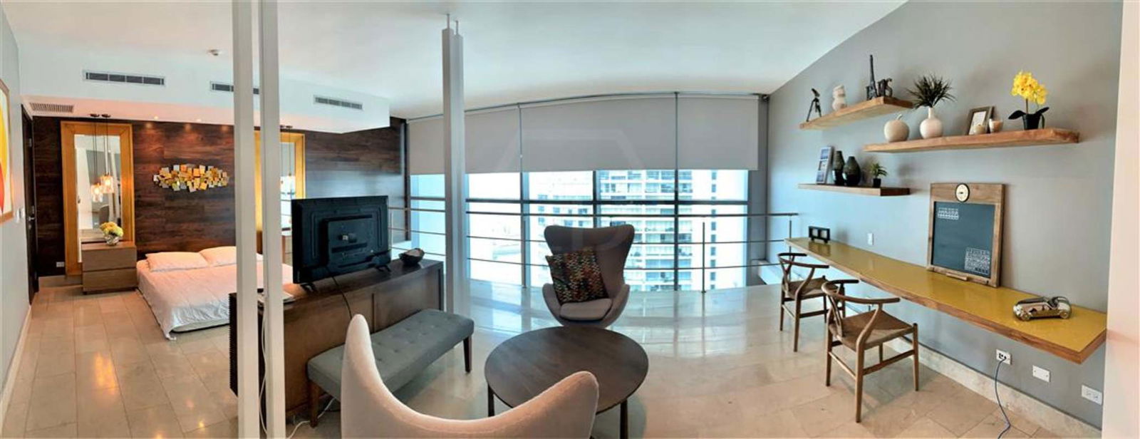 Open plan luxury living and dining in duplex Grand Tower Panama City