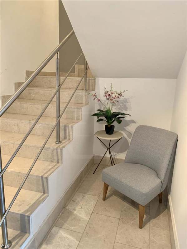 Modern staircase inside duplex luxury condo Grand Tower Punta Pacifica