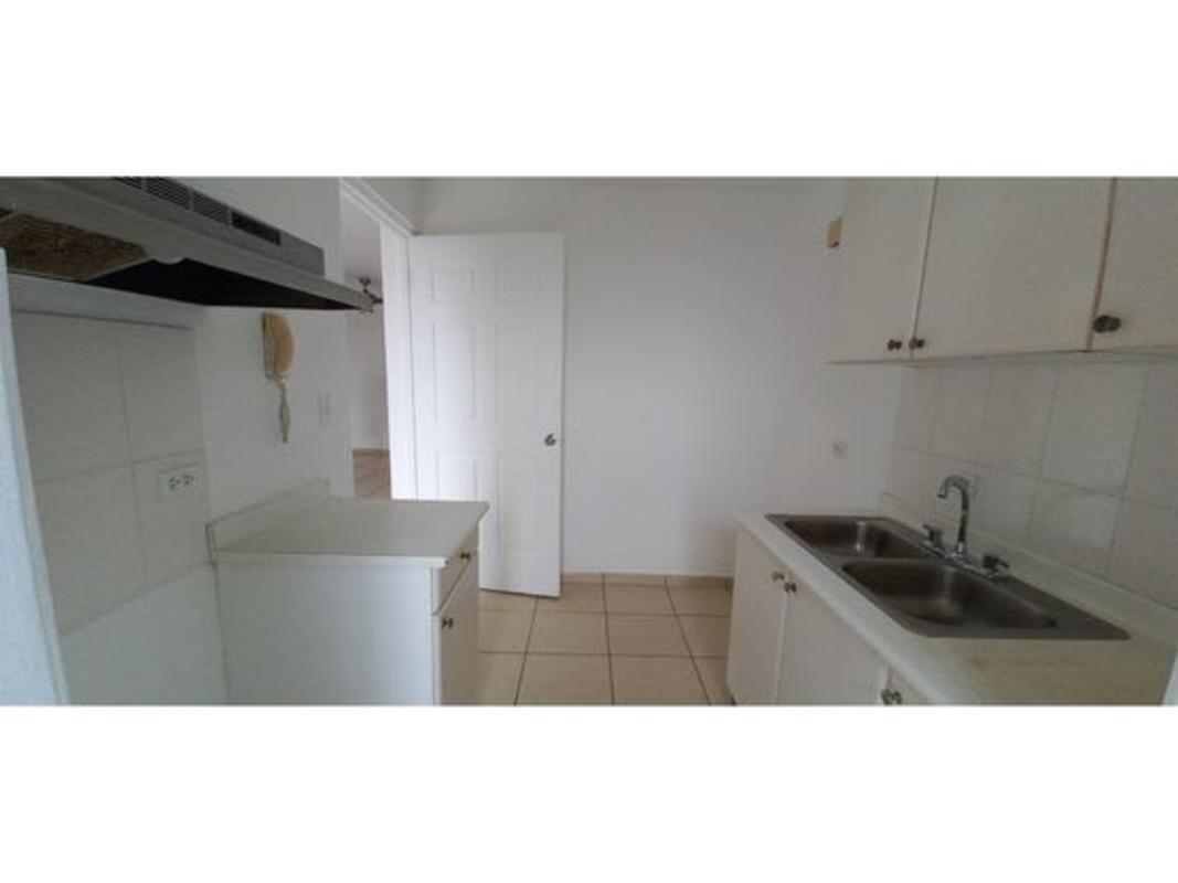 White minimalist kitchen with double sink cabinets backsplash PH La Locería Betania Panama