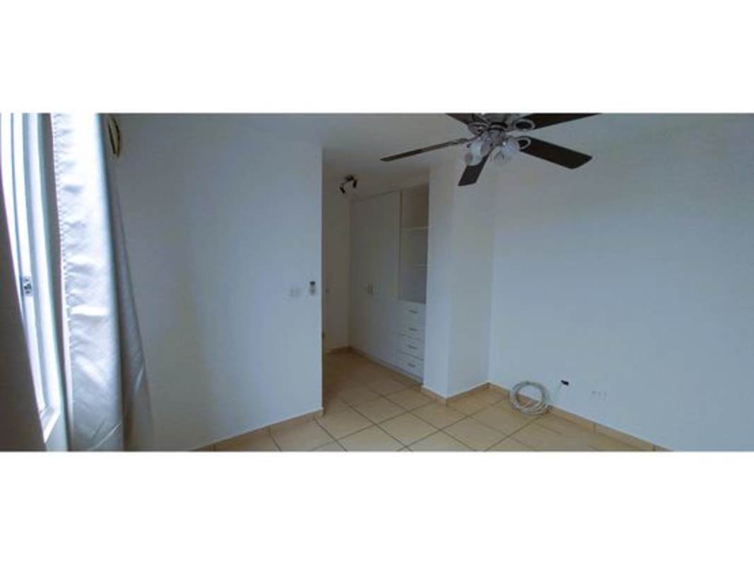 Bedroom with built-in closet ceiling fan and window PH La Locería Betania Panama