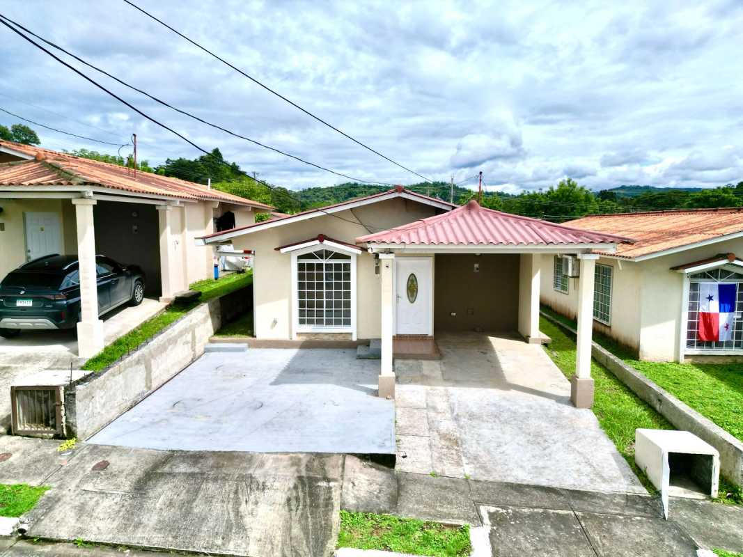Spacious living area with tile flooring and windows in Lagos del Norte home Panama City