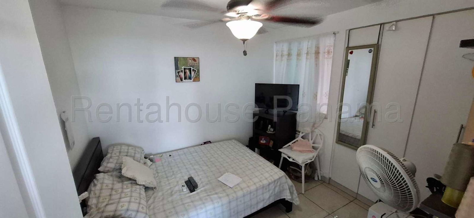 Bedroom featuring city skyline view, built-in closet, ceiling fan PH Puente del Rey