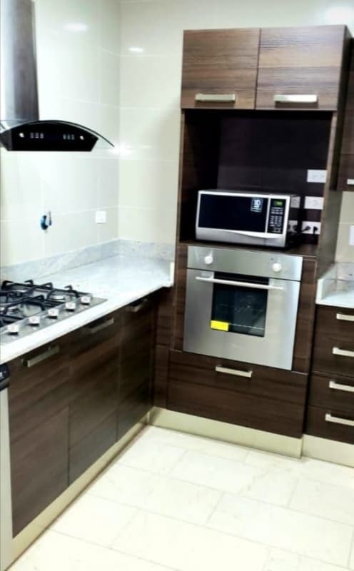 Spacious modern kitchen marble floor granite countertops PH Grand Tower Panama