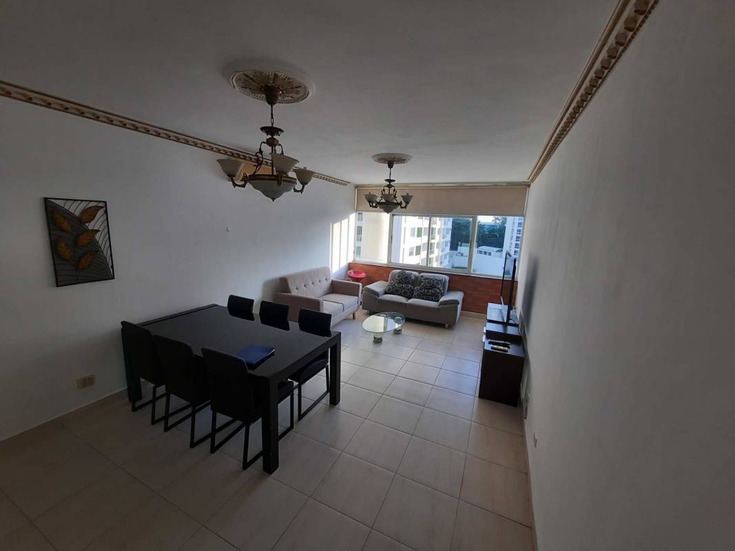 Bedroom with large corner windows, city view, minimalist decor in Edison Park Tower Panama