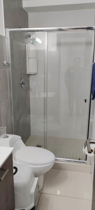 Furnished master bedroom with closet, air conditioning and fan in PH Midpark Carrasquilla Panama