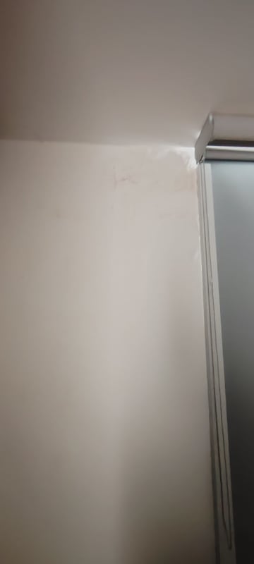 Spacious living room with beige sectional sofa and balcony city view PH Midpark Carrasquilla Panama