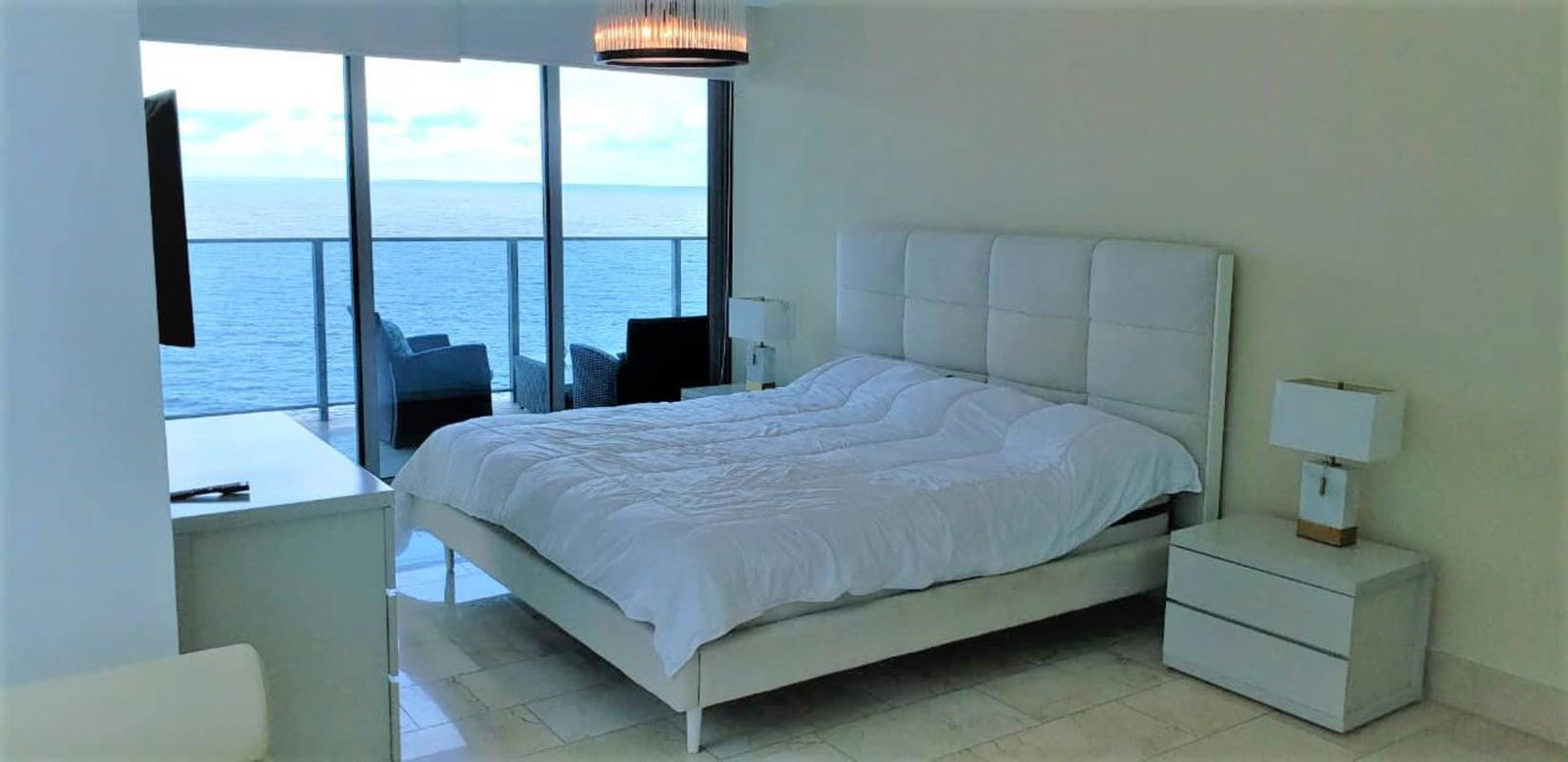 Large balcony with glass railing overlooking Pacific Ocean in PH Grand Tower Punta Pacifica Panama