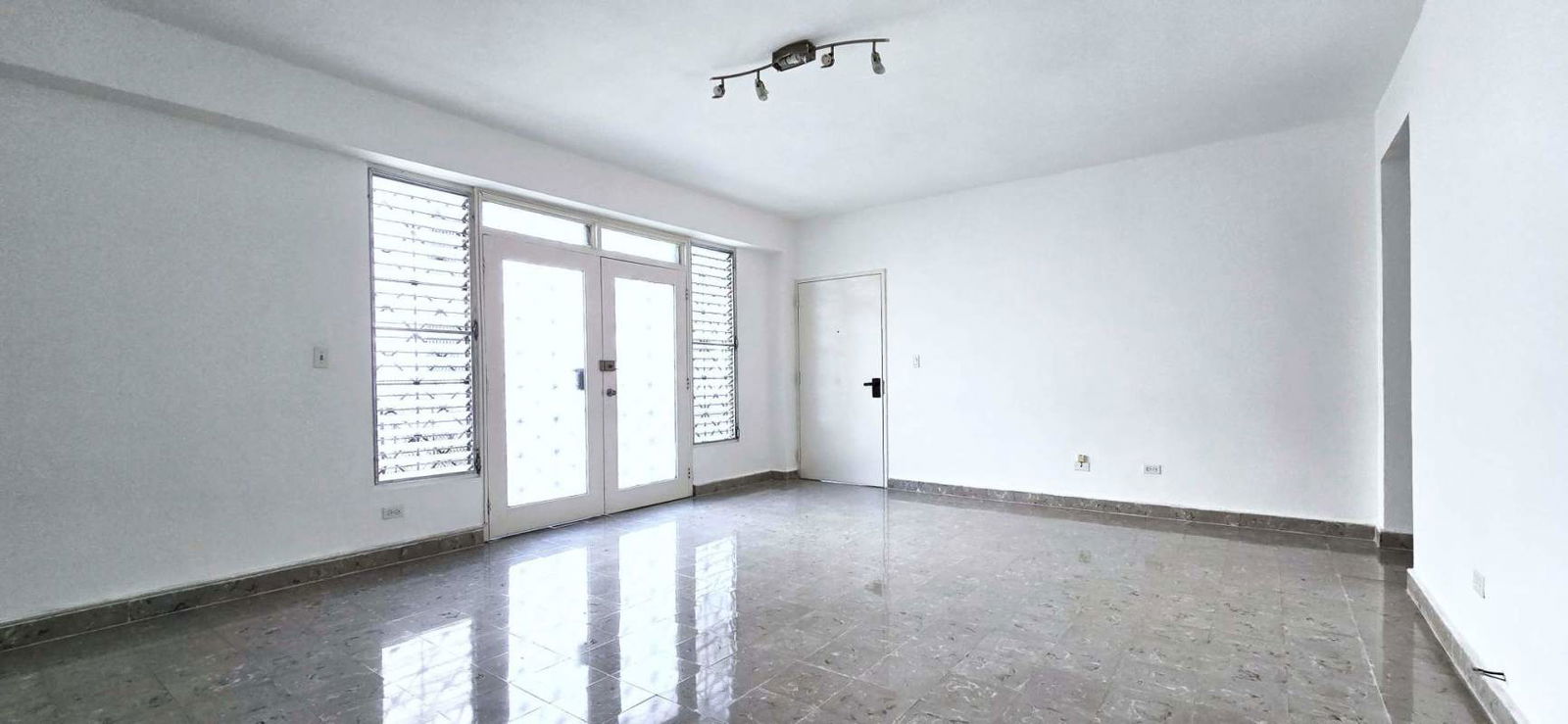 1-bedroom apartment with caoba closet, gray tile floor, window security bars in Bella Vista Panama