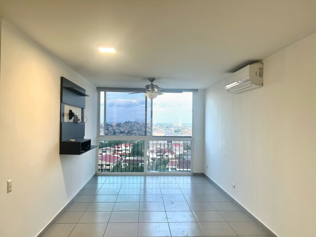 Kitchen with granite counter, stove, fridge, washer, dryer in PH Avinón Towers Panama City