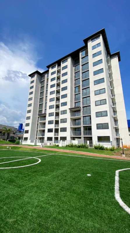 Aerial view modern condo complex with playgrounds and gardens in Panama City