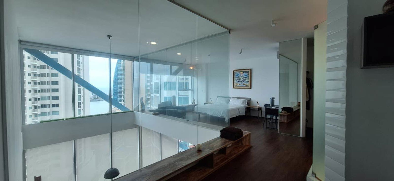 Modern bathroom with glass enclosed shower, vanity and designer tile at PH Loft 41 Punta Pacifica Panama