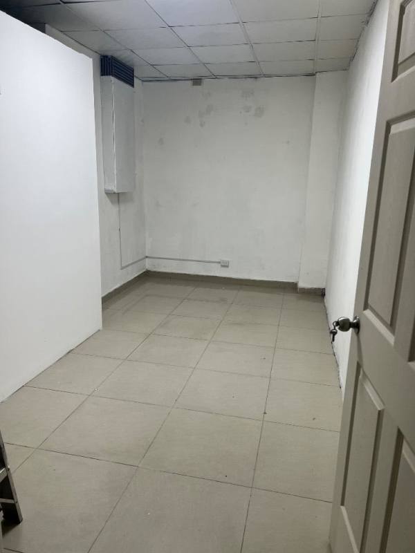 Dining table setup for office breaks in shared kitchenette at Plaza Feliz Panama