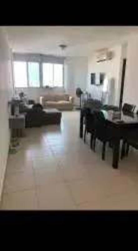 Second bedroom with split air conditioning, closet, white tiled floors Panama apartment rental