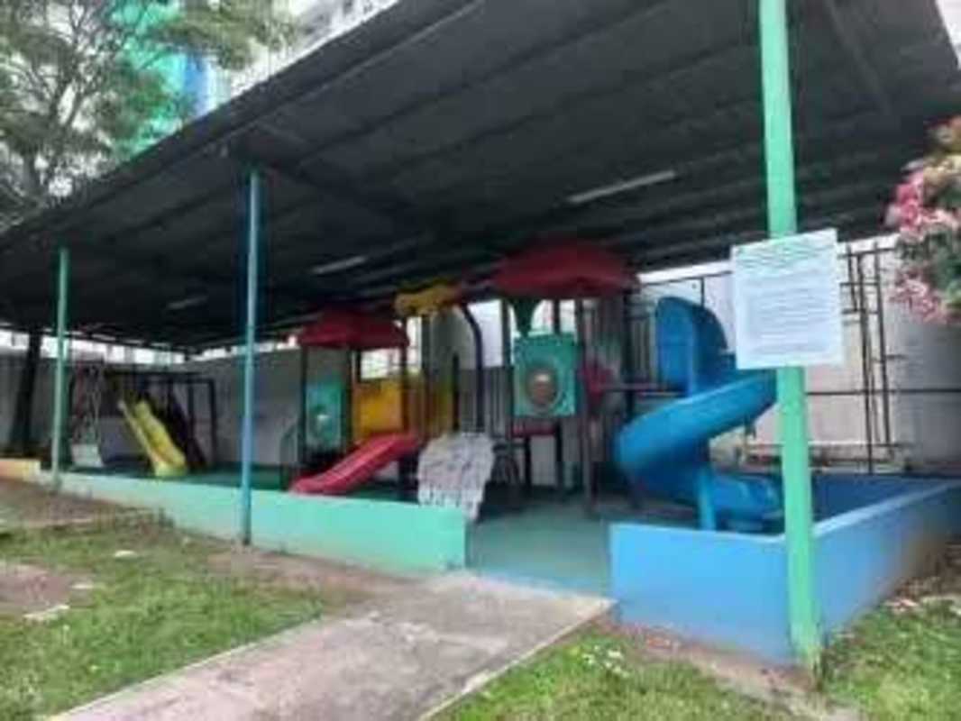 Outdoor multi-sport court with basketball goals inside Imperial Towers residential complex Panama