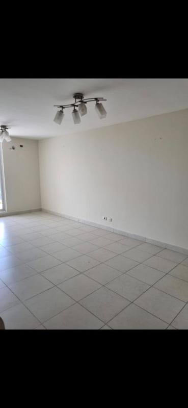 Modern bathroom with glass shower, vanity and large mirror at PH Torres de Cantabria Las Acacias Panama City