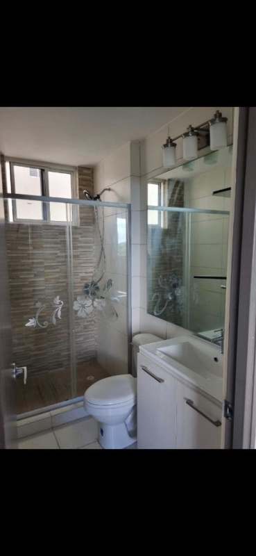 Stylish bathroom with enclosed glass shower, modern vanity in PH Torres de Cantabria Las Acacias Panama