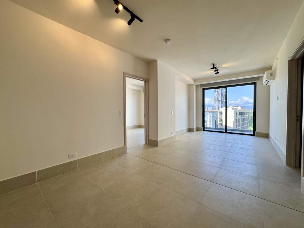 Bright living room with marble floors and balcony at PH Ocean House Santa Maria Panama