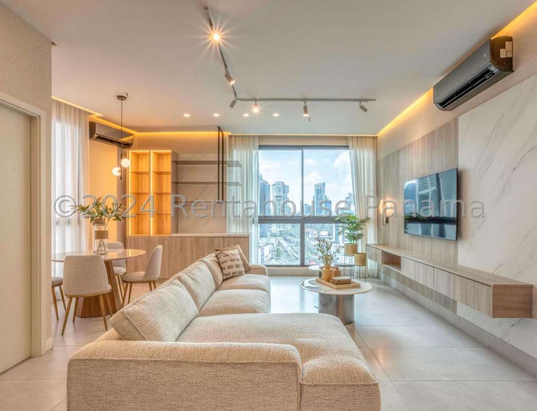 Minimalist living dining area with panoramic windows PH Ocean Vista Panama