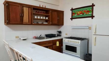 Bedroom with tiled floor, AC unit, and two beds apartment El Valle Coclé Panama