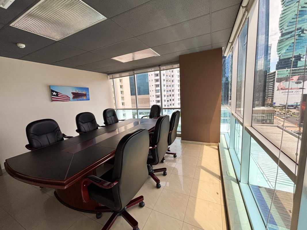 Open office workspace with city view windows and tiled flooring, City Center Tower Panama City
