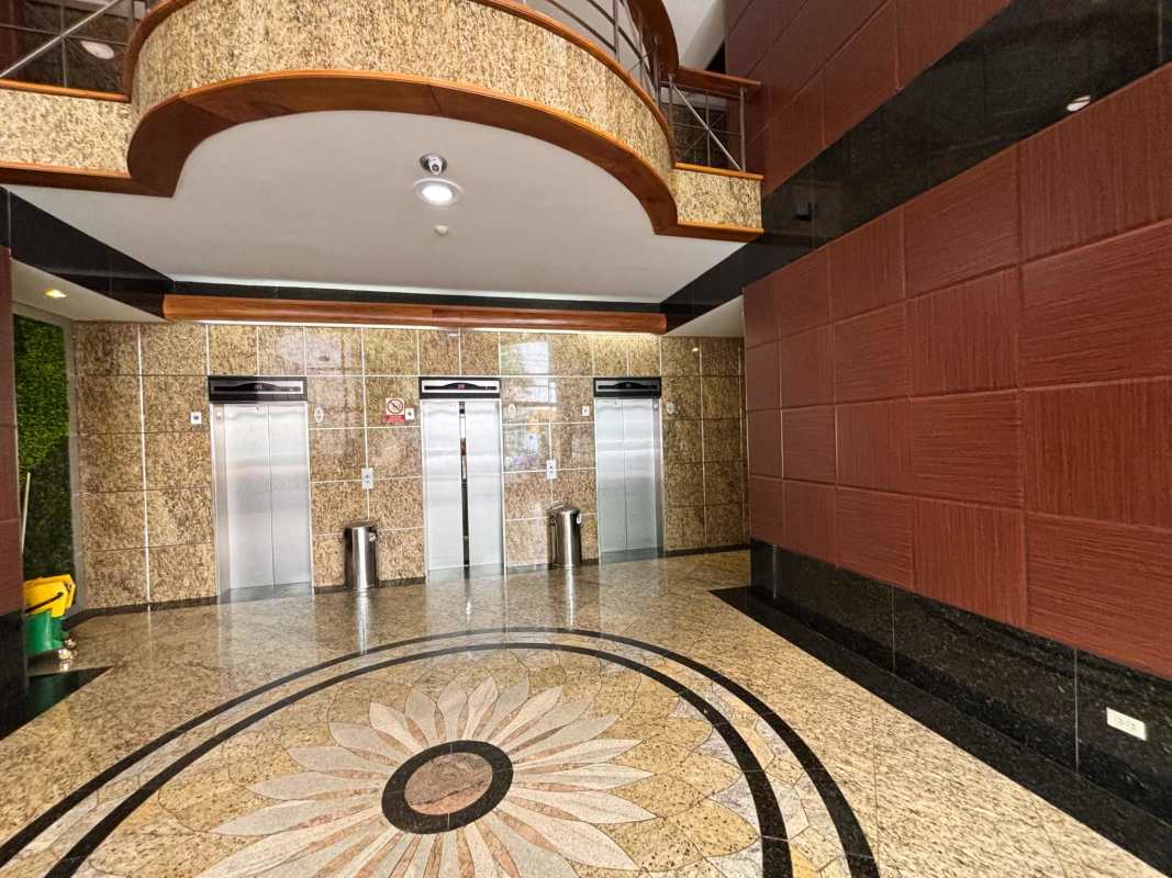 Luxury building lobby with granite floors floral design elevators City Center Tower Obarrio Panama