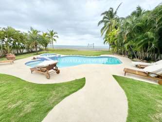 Spacious dining and recreation area with pool table, high ceilings at Buenaventura Panama