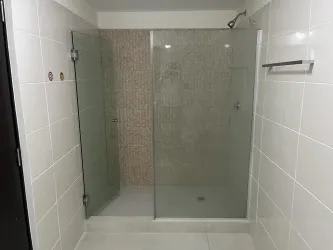 Living-dining area with large sliding doors to balcony PH Morgan Howard Panama