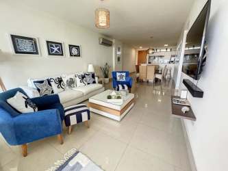 Open kitchen with granite countertops and dining space PH CasaMar beachfront apartment Panama