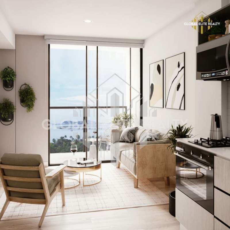 Bright living-dining area with marble floors at PH Alexa Bella Vista Panama