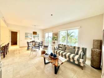 Covered balcony overlooking Pacific Ocean and resort pools at Puntarena Buenaventura Panama