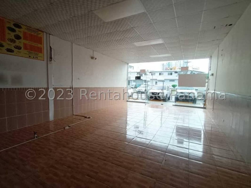 Facade of multi-tenant commercial plaza in Parque Lefevre with parking and signage Panama City