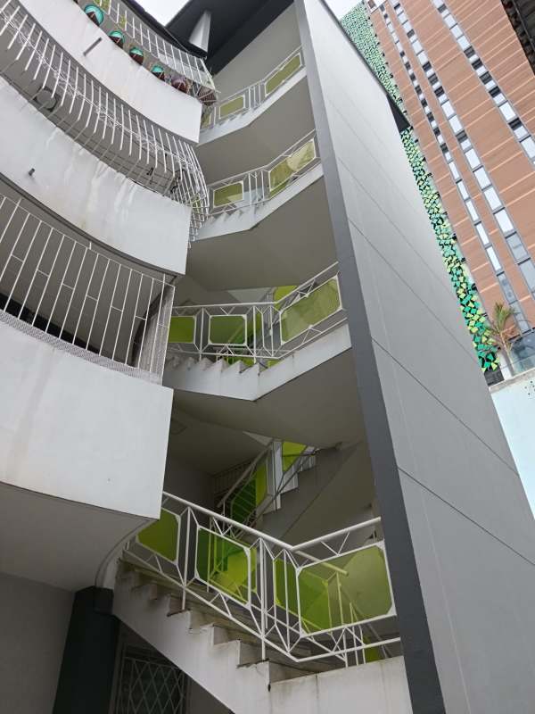 Covered gated parking area at Panama multi-unit residential building for sale