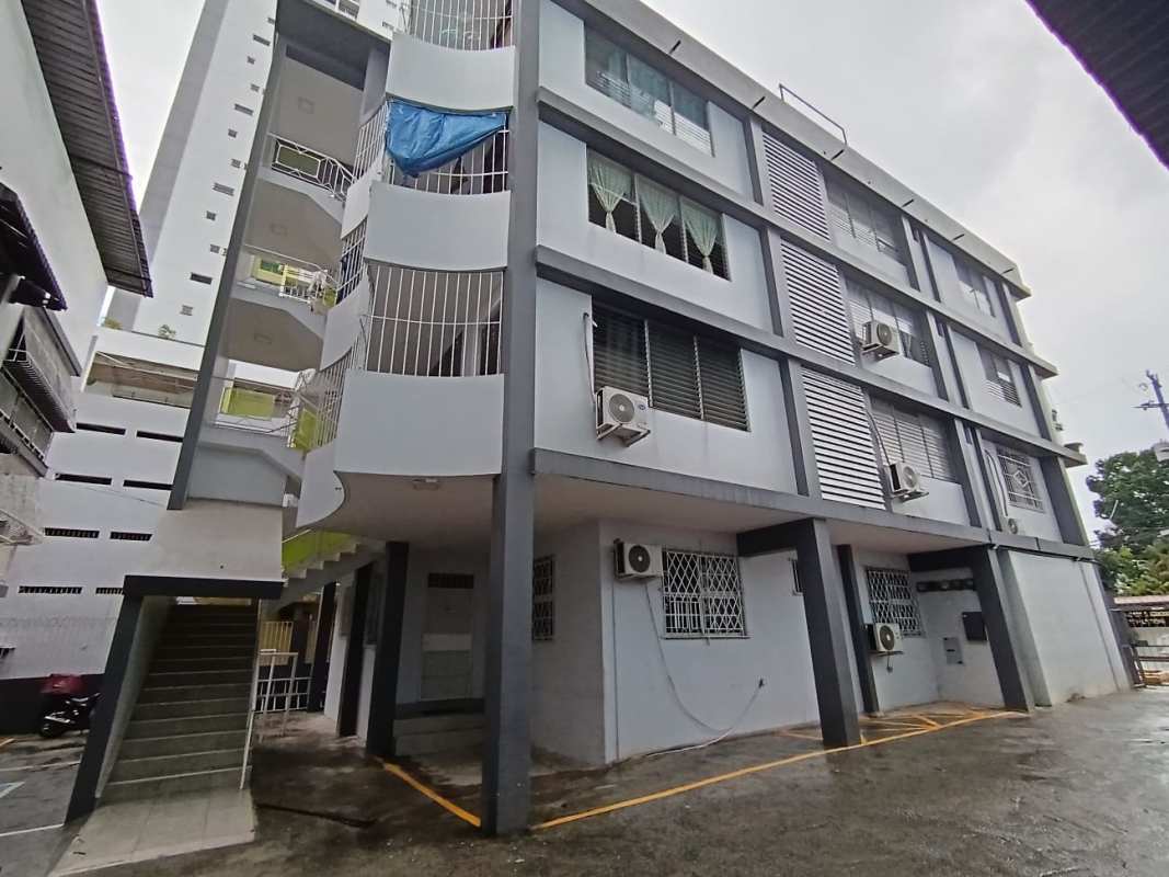Exterior view low rise apartment investment building with balconies Panama