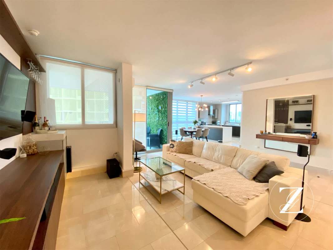 Integrated dining area and modern kitchen with marble floors PH Vita Coco del Mar Panama City