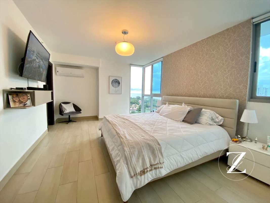 Bright secondary bedroom city view large windows PH Vita Coco del Mar