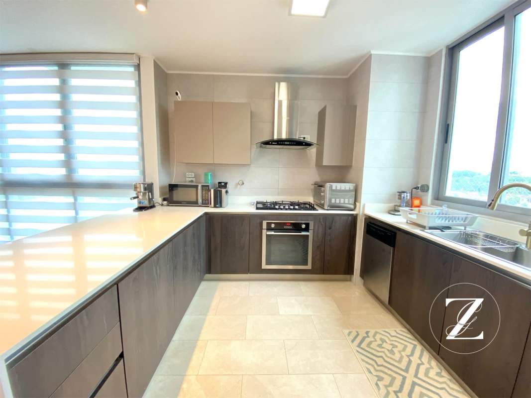 Contemporary kitchen with quartz countertops excellent finishes at PH Vita Coco del Mar