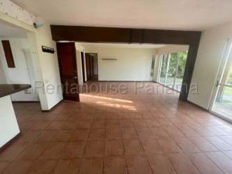 Tropical swimming pool among palm trees inside Villas Decameron Resort Panama