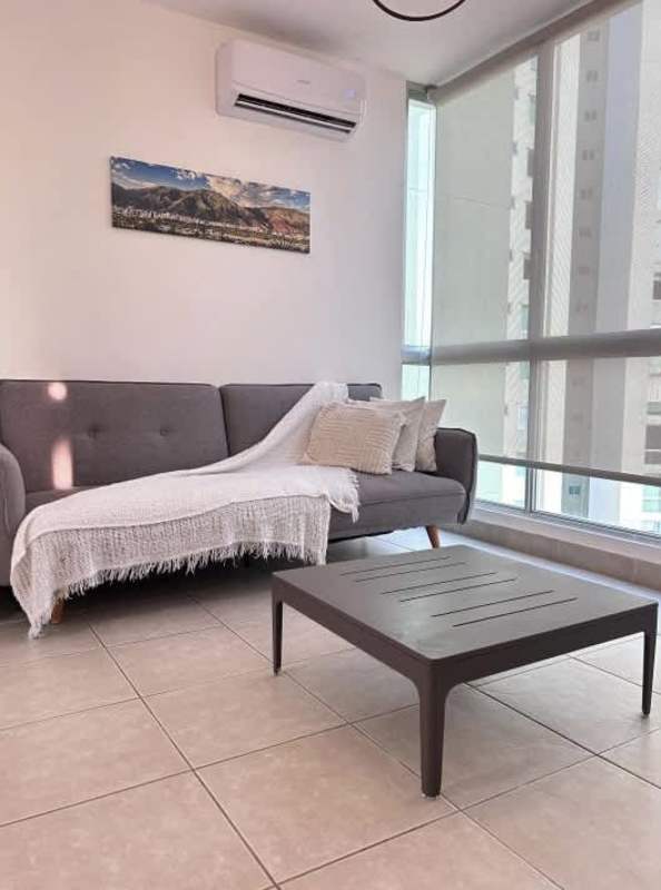 Modern furnished living room with large windows AC in PH Green Bay Costa del Este apartment Panama