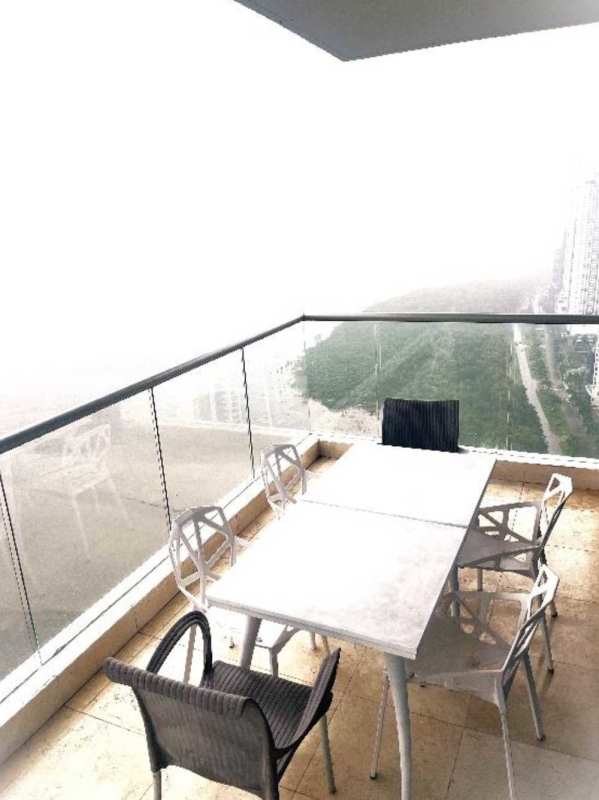 Luxury master bedroom with balcony and panoramic ocean views at Ten Tower Costa del Este Panama