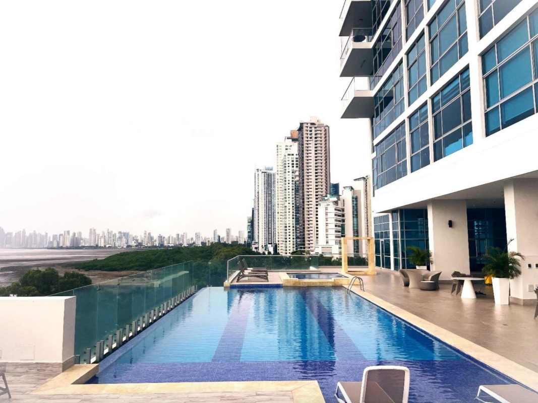 Spacious bathroom with double vanity, bathtub and ocean views in Ten Tower apartment Panama