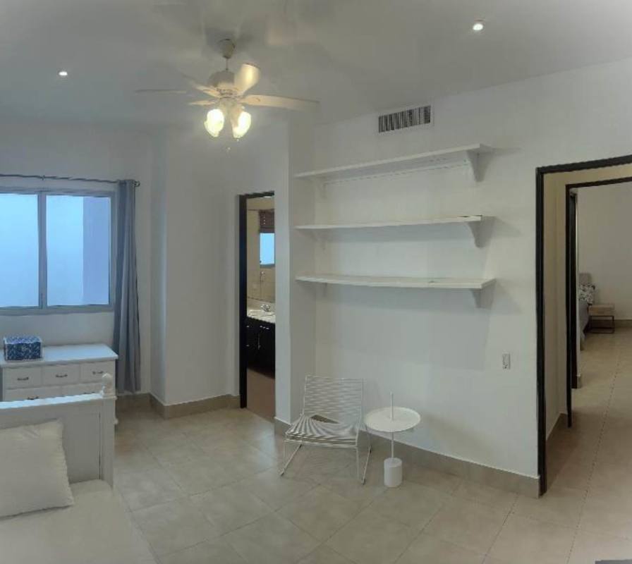 Spacious kitchen with island, granite counters and appliances in Ten Tower Costa del Este Panama