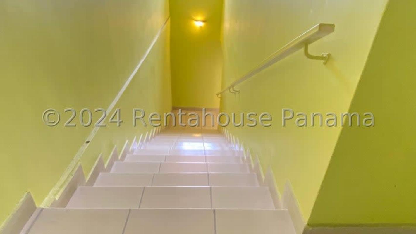 Bedroom with tiled floor, AC, window with bars Cerro Viento Panama