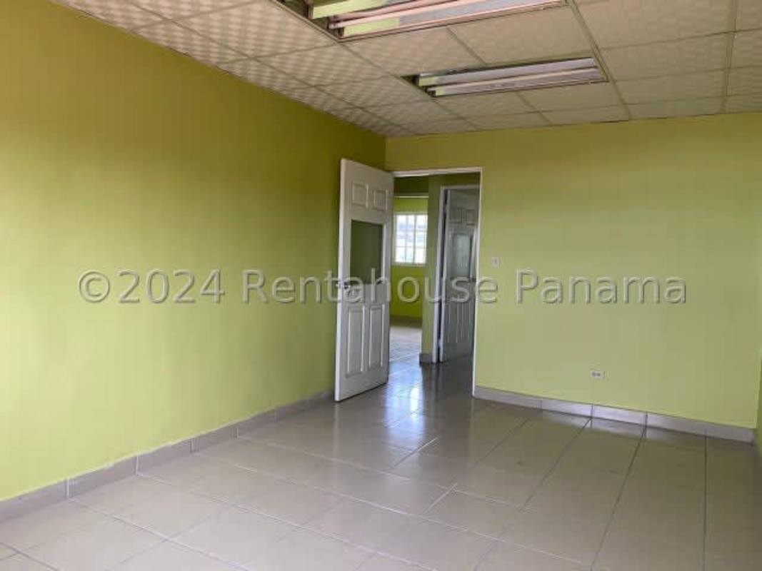 Bright hallway decorated with colorful children's murals in duplex house Cerro Viento Panama